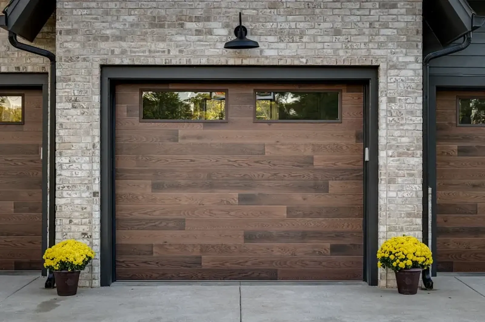 Garage Door Masters KC service van in a Kansas City driveway