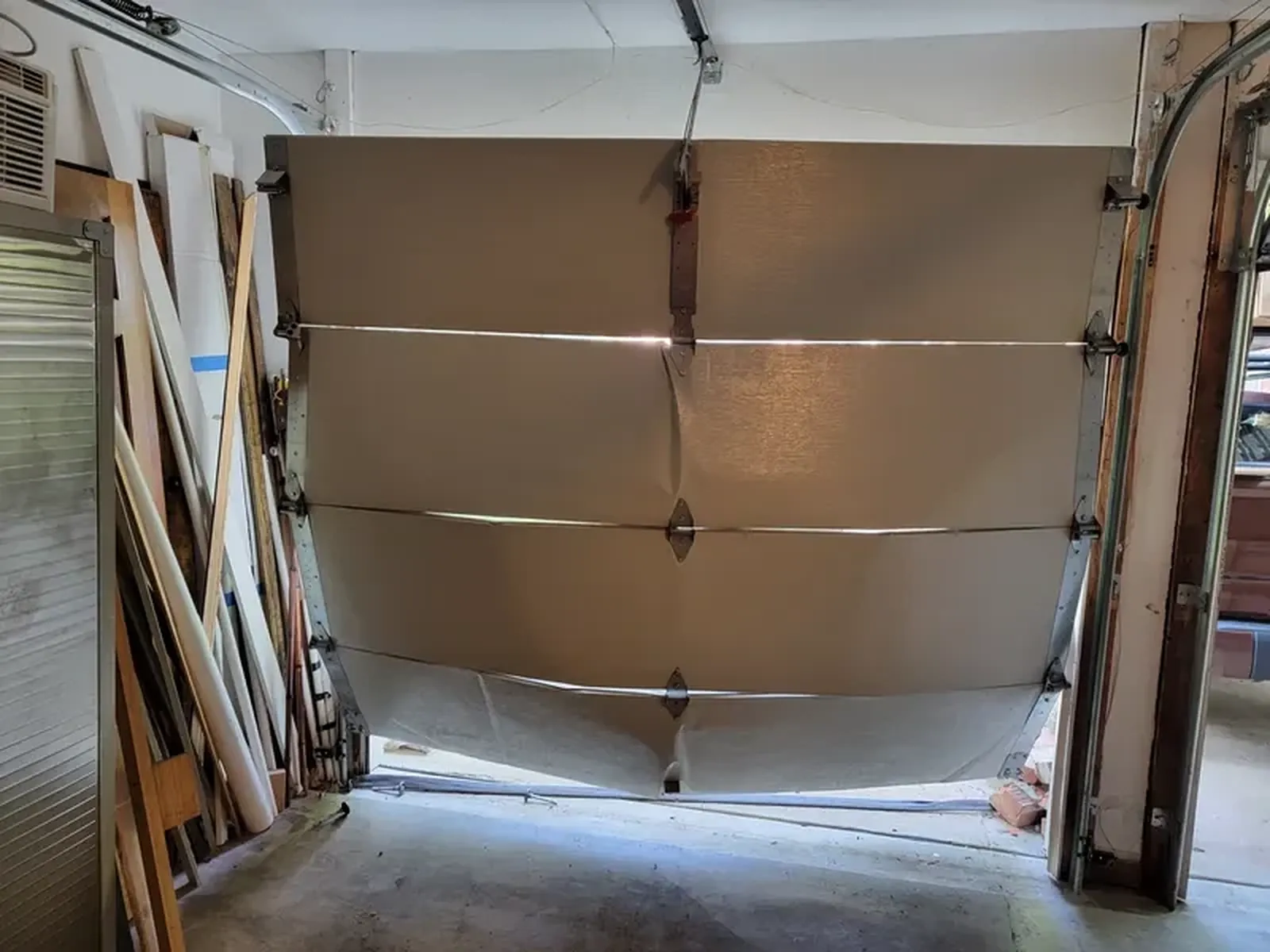 Garage Door Off Track — Garage Door Masters KC