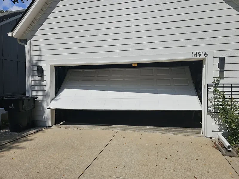 Garage door spring and hardware tune-up