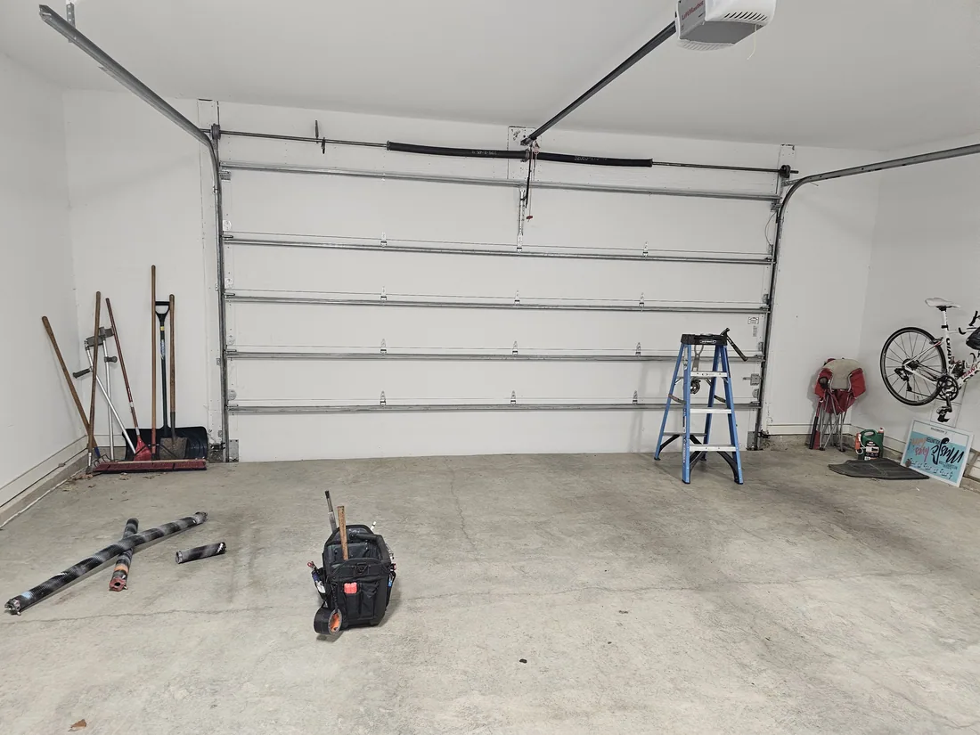LiftMaster belt-drive garage door opener installed on a residential door in Kansas City KS