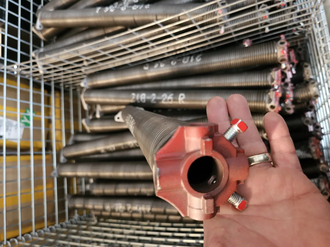 Garage door tune-up — lubricating rollers, hinges and tracks on a KC metro residential door