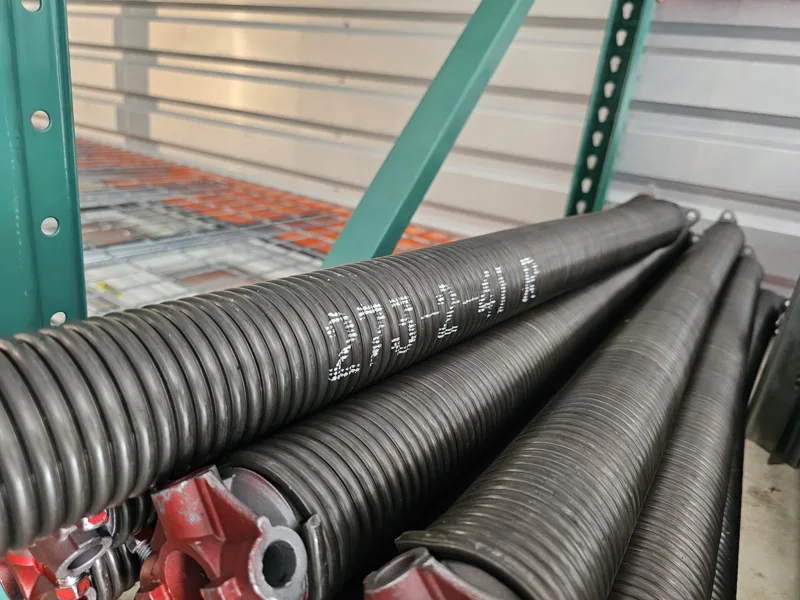 Torsion springs in stock at the Garage Door Masters KC warehouse